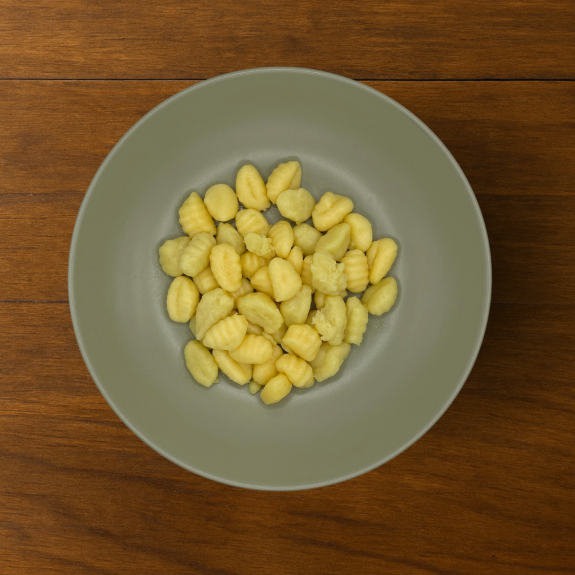GNOCCHI-DI-PATATE-sfondo-legno.png